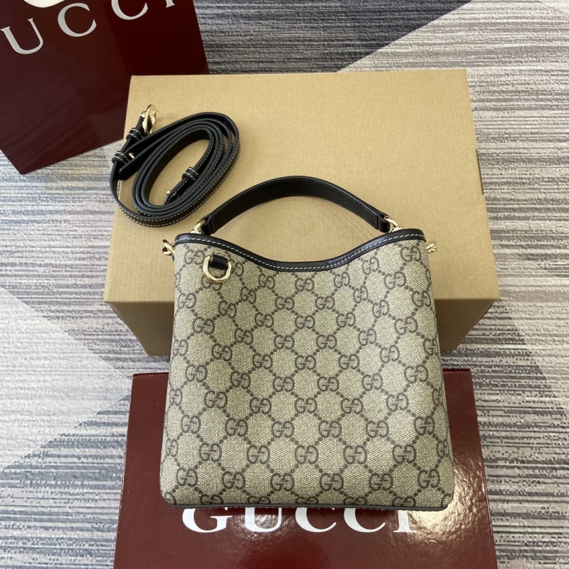 G*u*i top handle bags